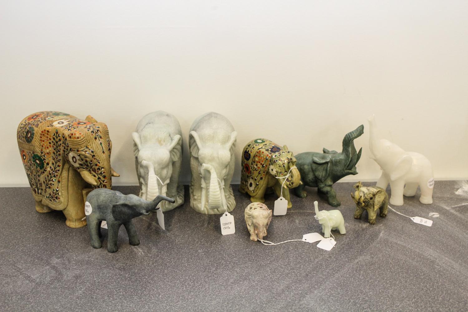 A Collection of Ten Hardstone Elephant Figures Height of tallest 8 1/4 inches.