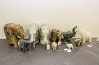 A Collection of Ten Hardstone Elephant Figures Height of tallest 8 1/4 inches.
