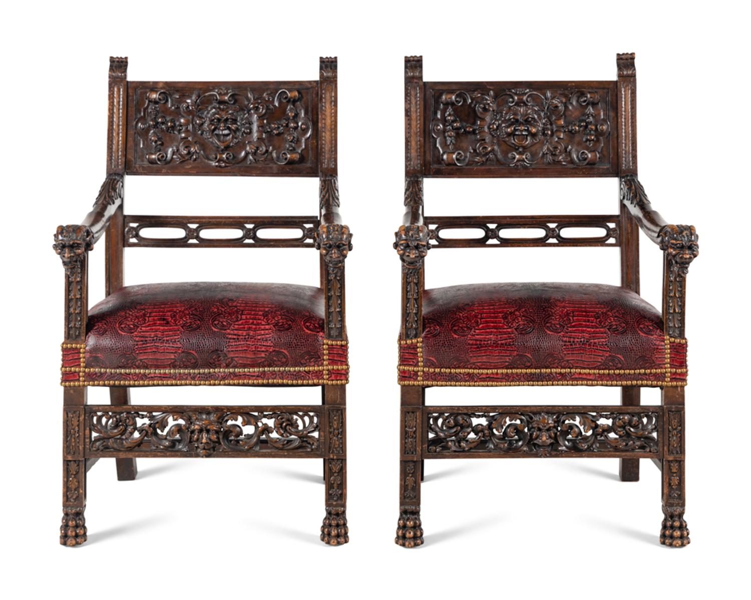 A Pair of Italian Renaissance Revival Carved Walnut Armchairs