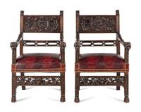 A Pair of Italian Renaissance Revival Carved Walnut Armchairs