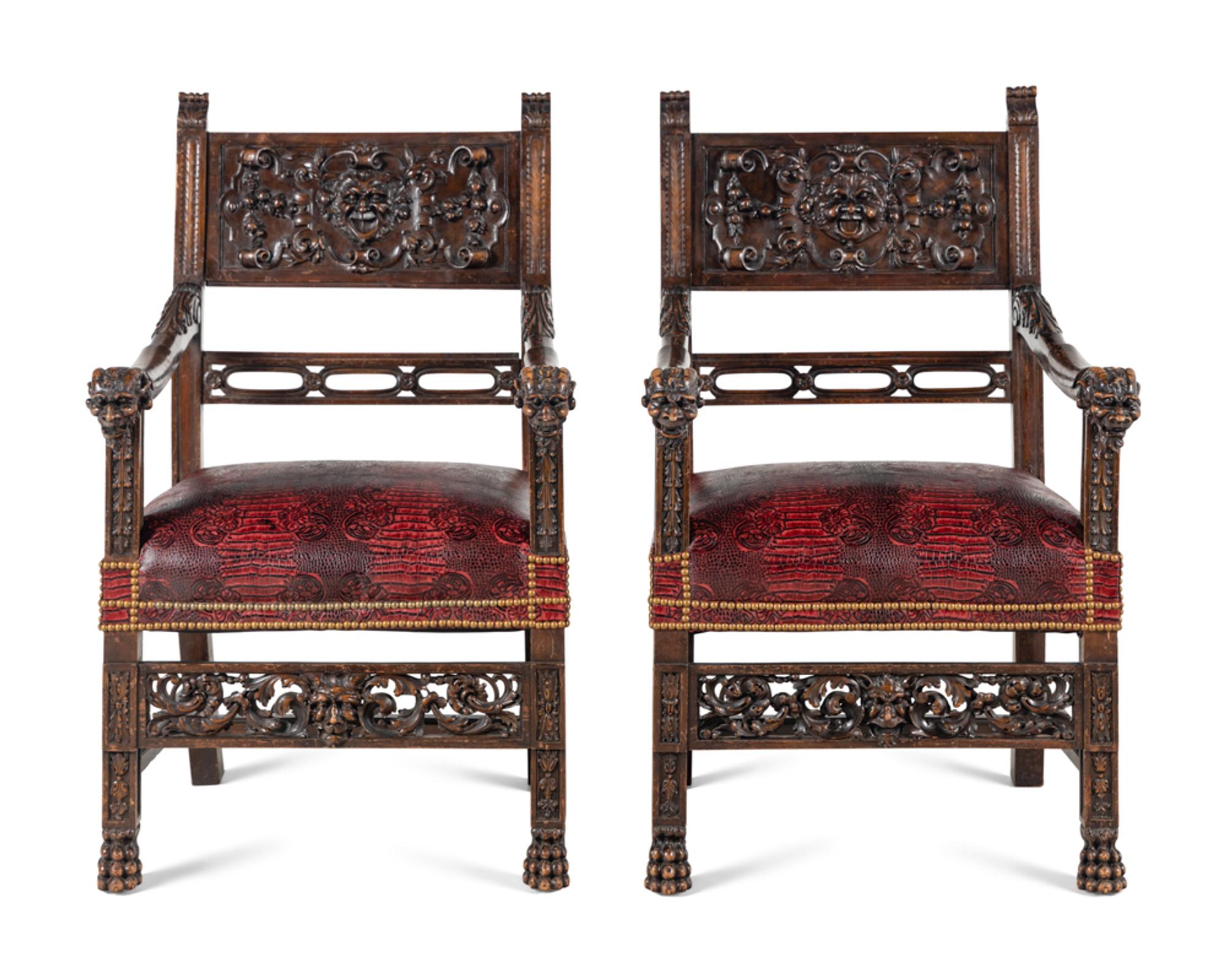 A Pair of Italian Renaissance Revival Carved Walnut Armchairs