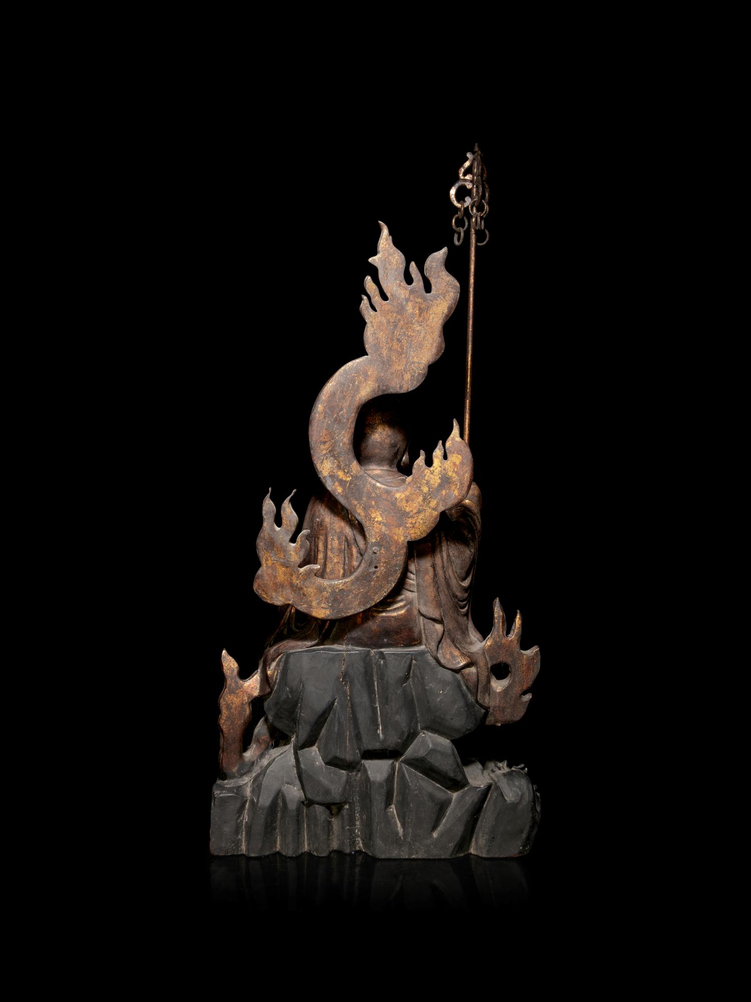 A Large Gilt Decorated Wood Figure of a Seated Monk