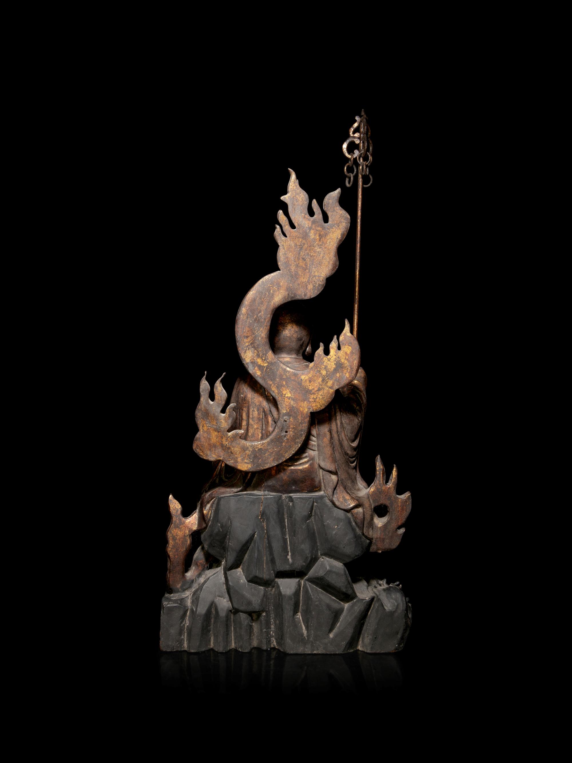A Large Gilt Decorated Wood Figure of a Seated Monk