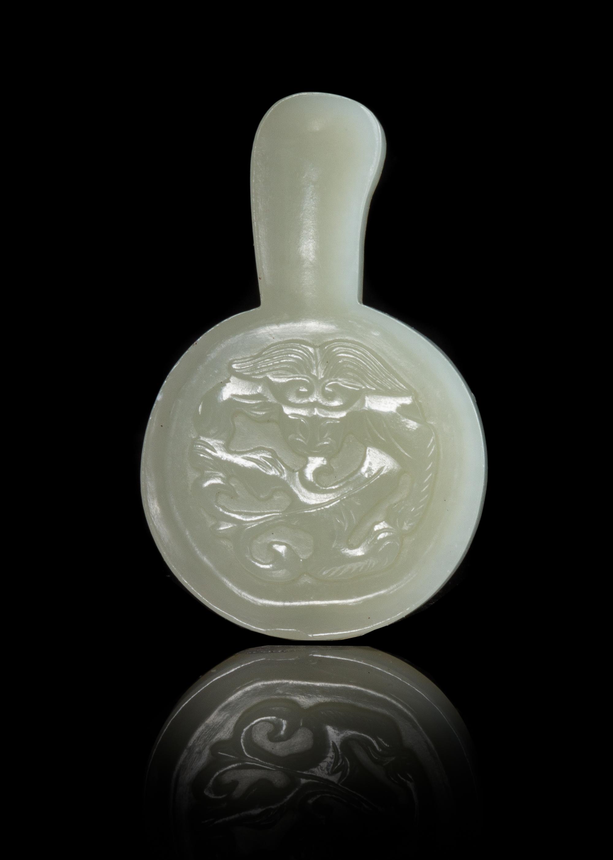 A Pale Celadon Jade Brush Rest Length 2 3/4 inches. — 18TH/19TH CENTURY