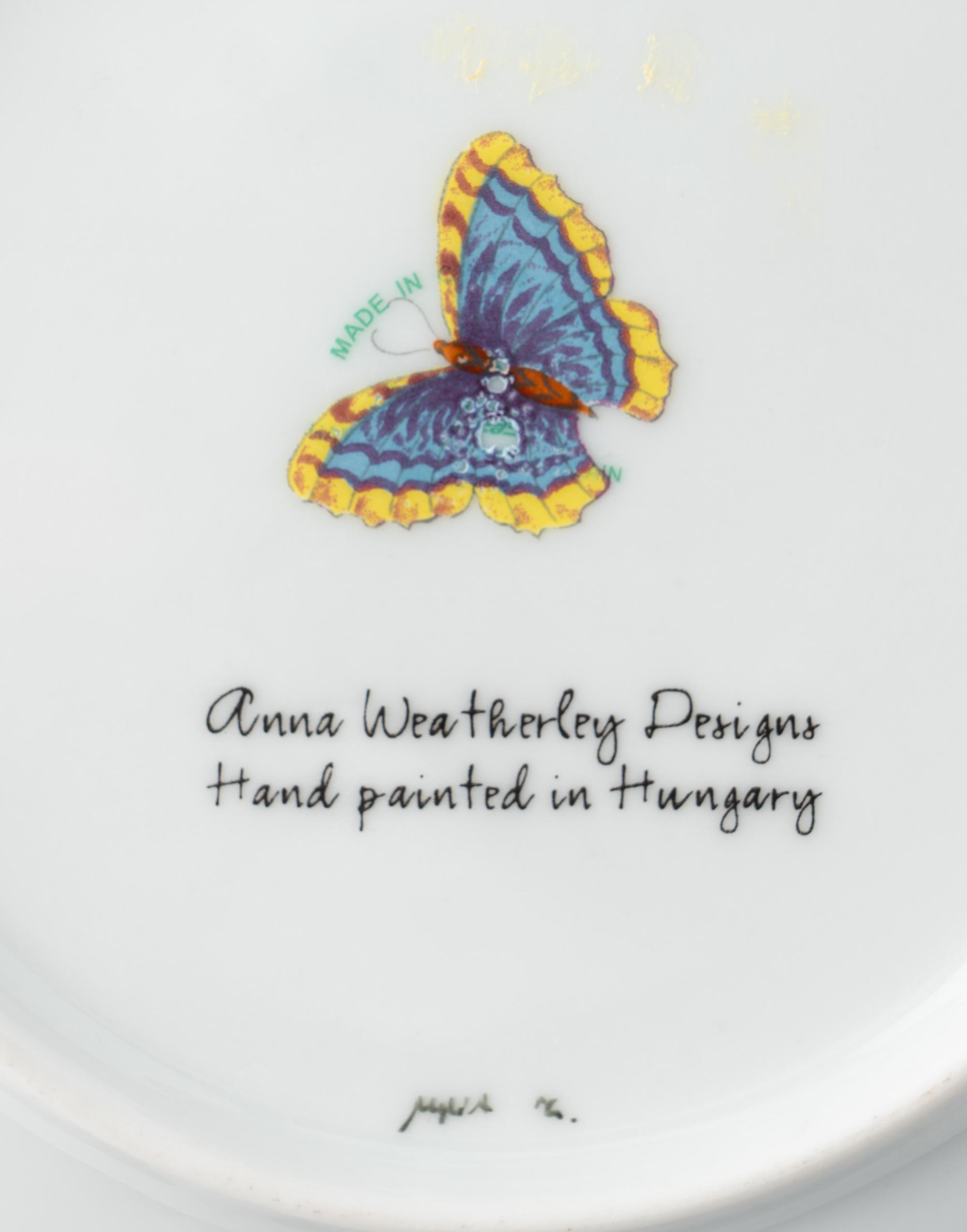 An Anna Weatherley Green Leaf Porcelain Dinner Service