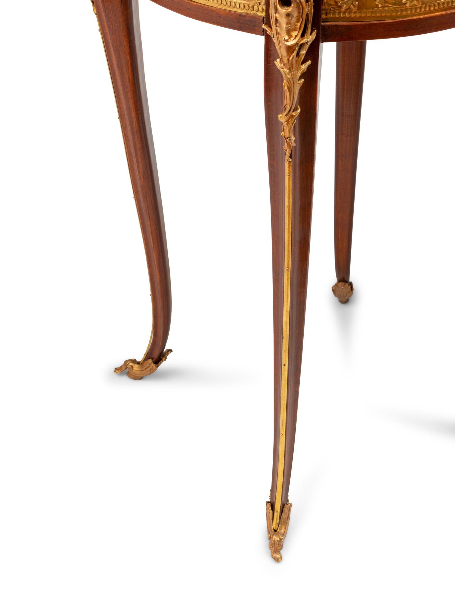 A Pair of Louis XV Style Gilt Metal Mounted Marquetry Tables
