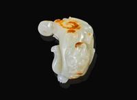 A Chinese carved white jade bixie, Qing dynasty, 18th century 白玉雕辟邪 清 十八世紀