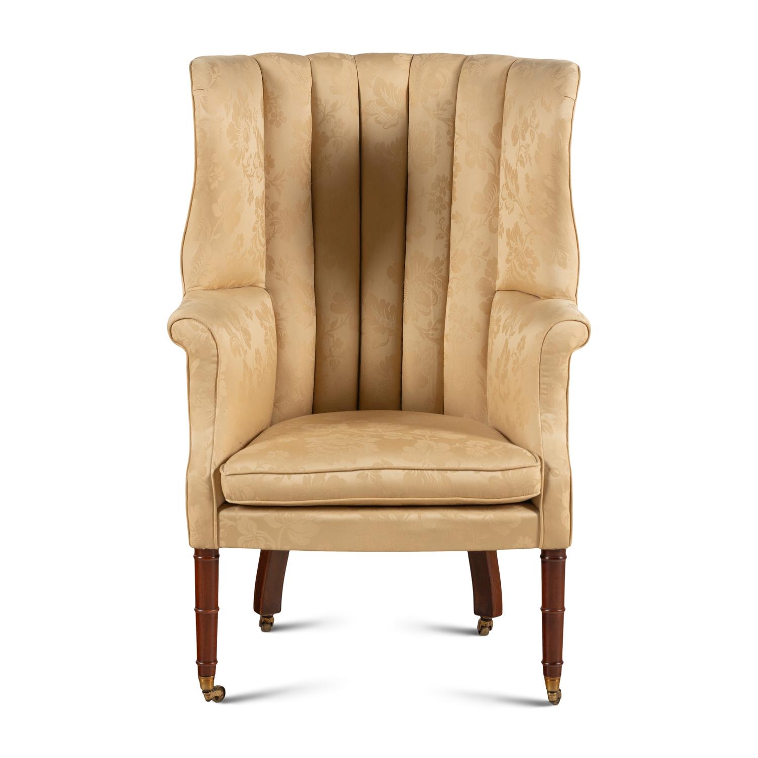 An English Mahogany Wingback Armchair
