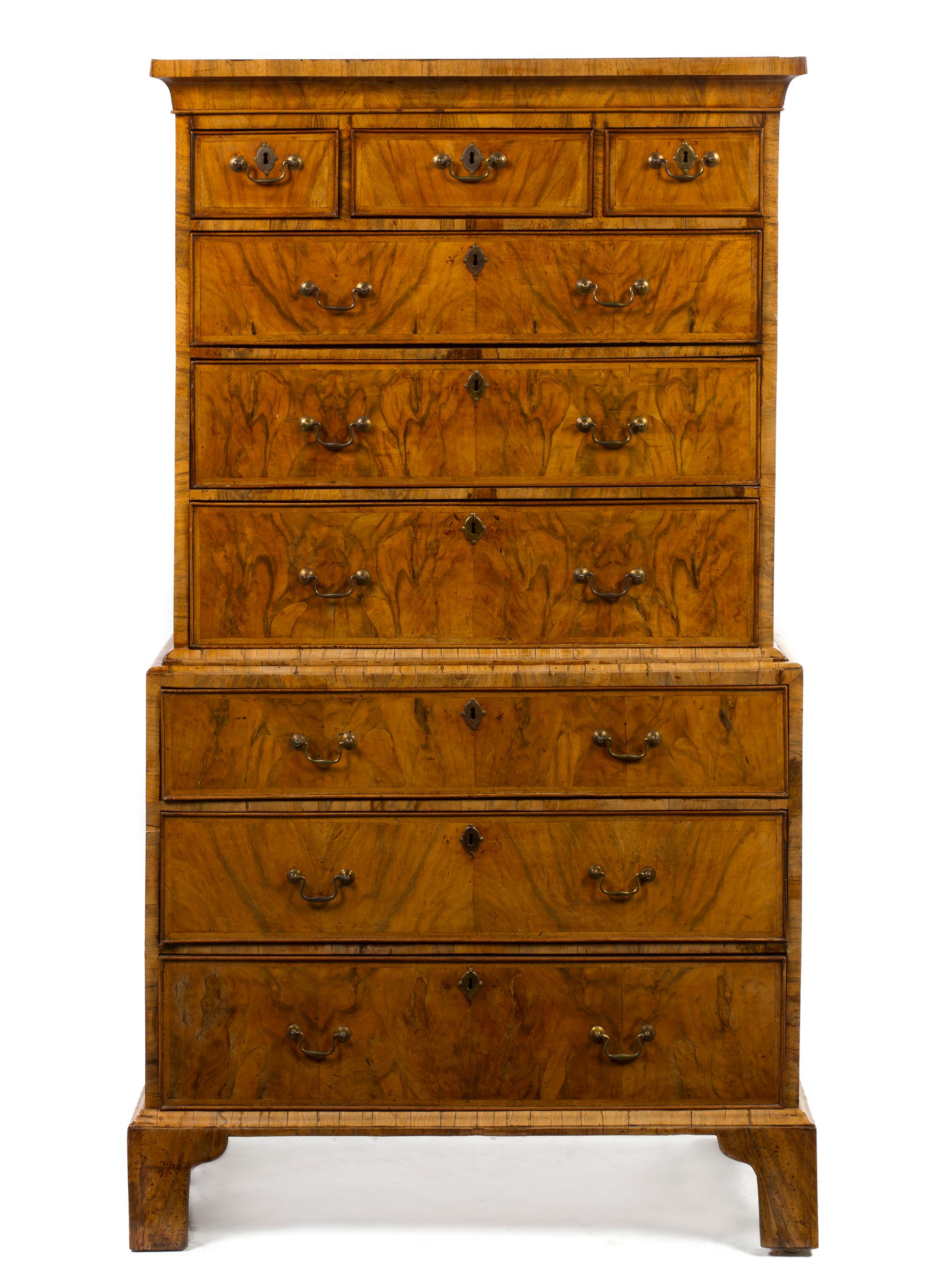A George II Style Walnut Chest on Chest, Height 67 3/4 x width 37 3/4 x depth 19 3/4 inches.