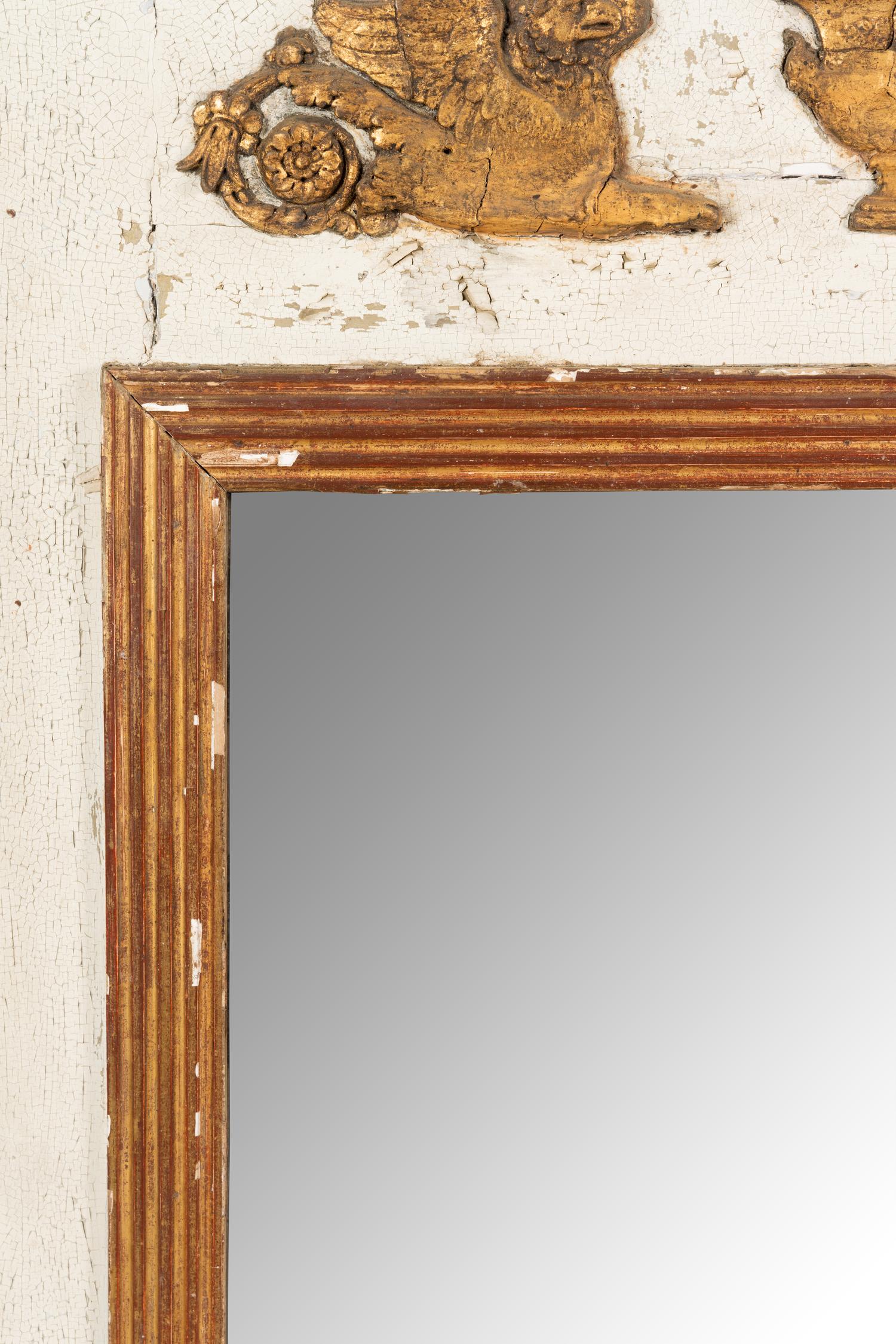 An Empire Style Painted and Parcel Gilt Mirror