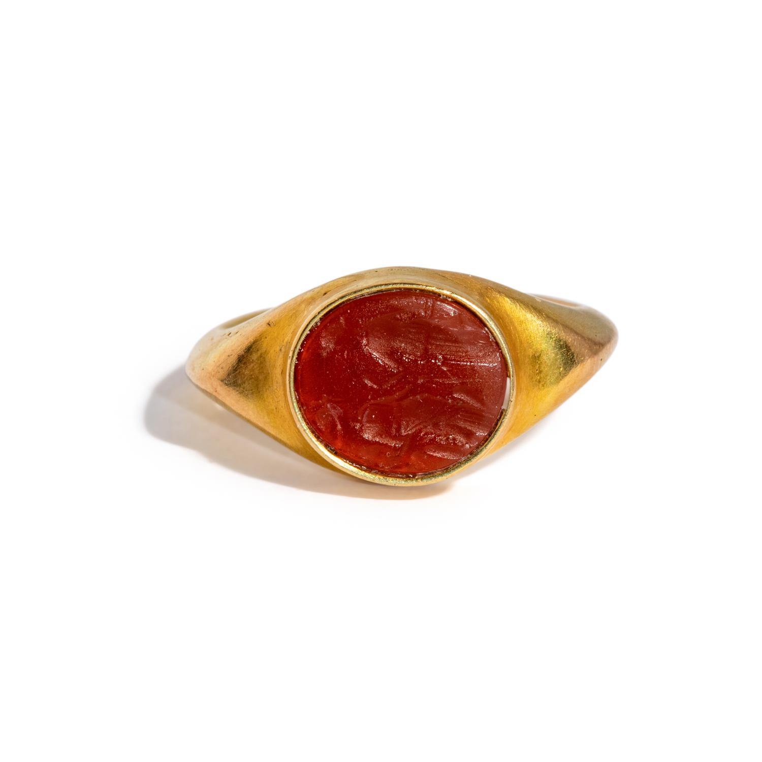 A Roman Gold and Carnelian Finger Ring with the Goddesses Ceres and Persephone