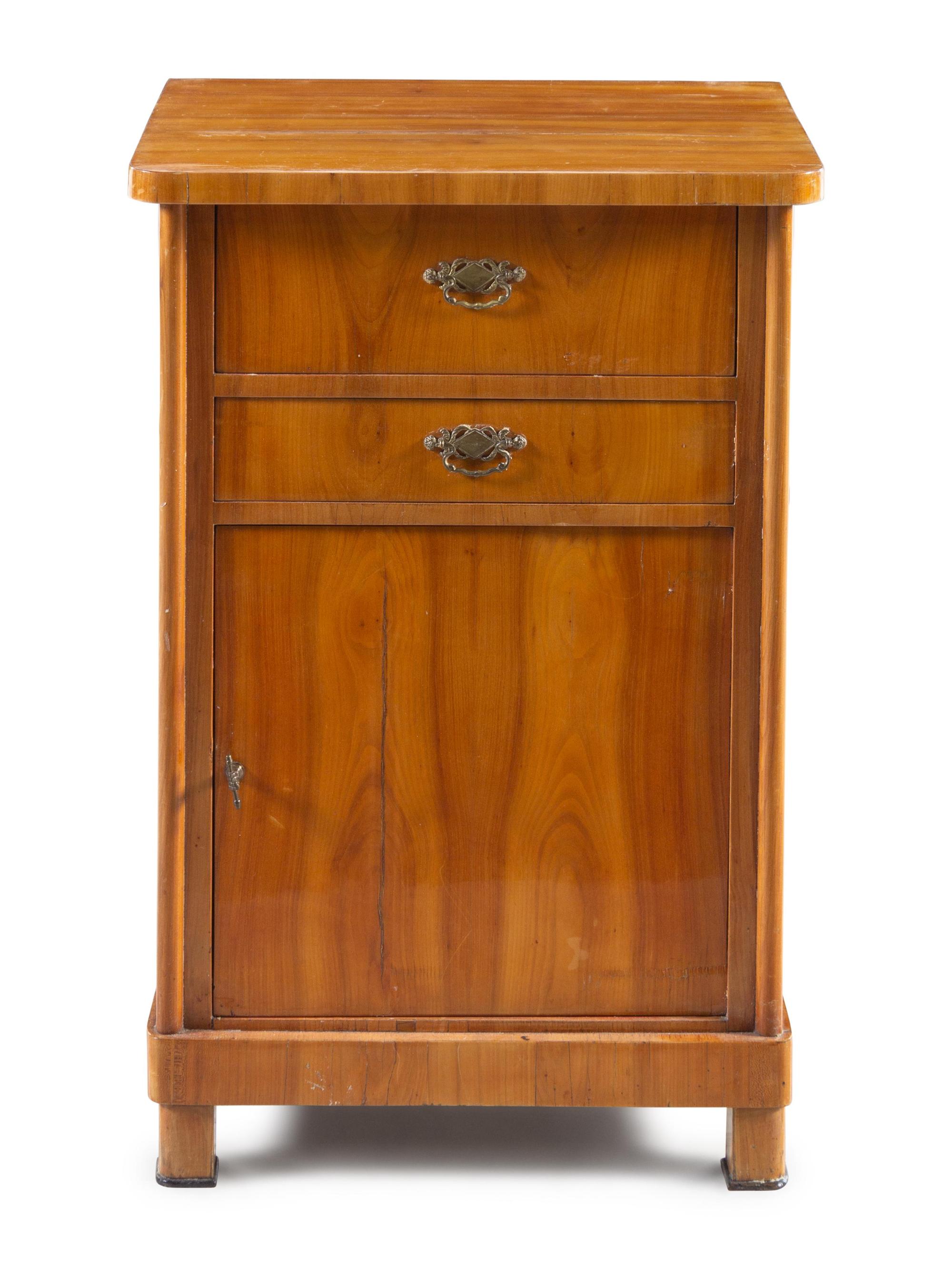 A Continental Walnut Cabinet