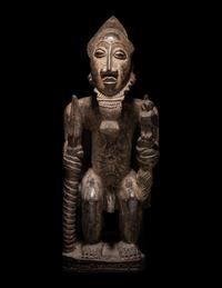 A Baule Wood Seated Male Figure