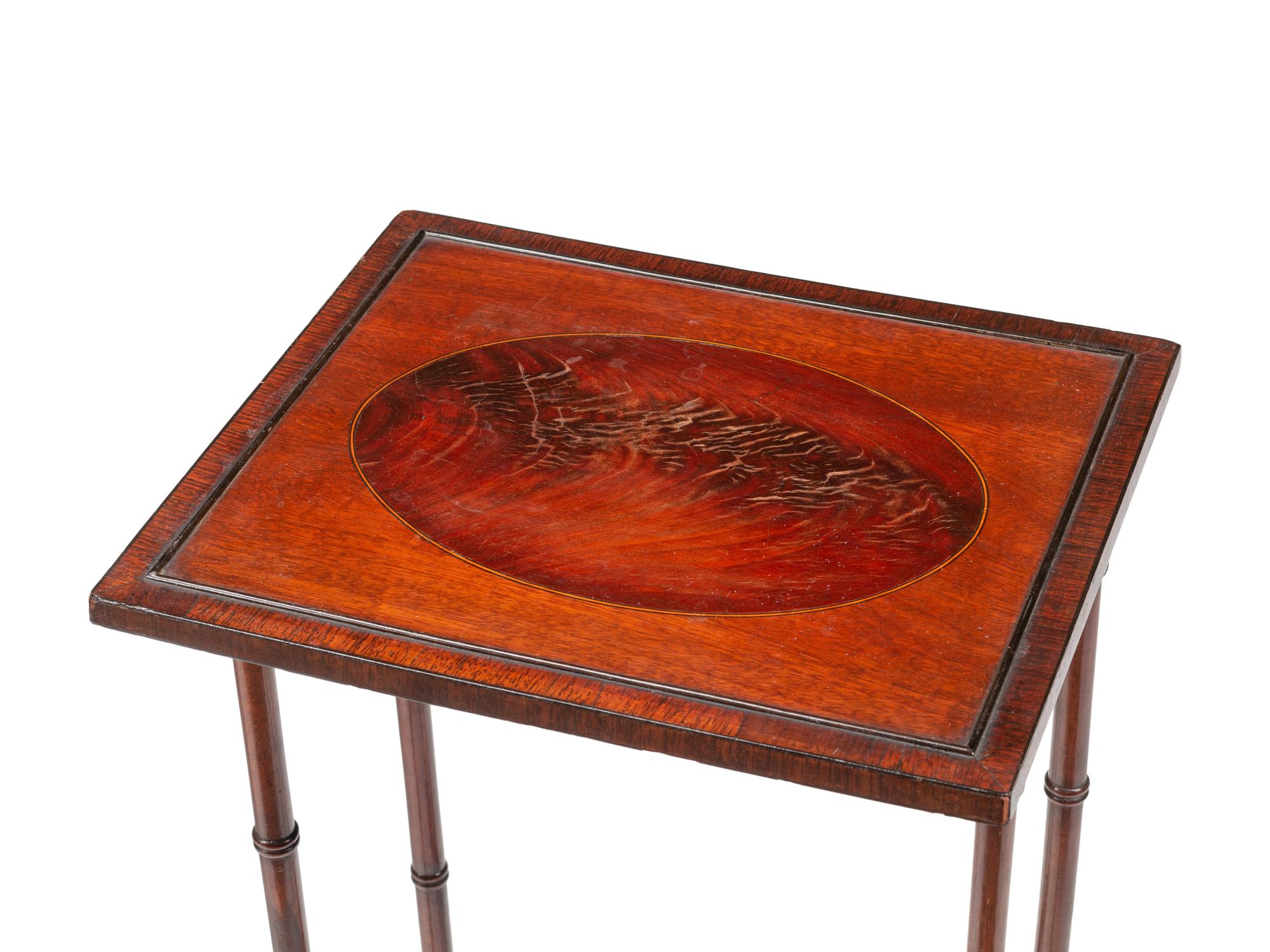 A Set of Four Edwardian Mahogany Nesting Tables