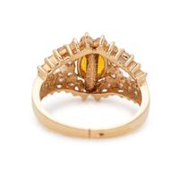 ORANGE SAPPHIRE AND DIAMOND RING