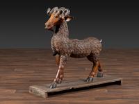 A Folk Art Carved and Painted Wood Ram
