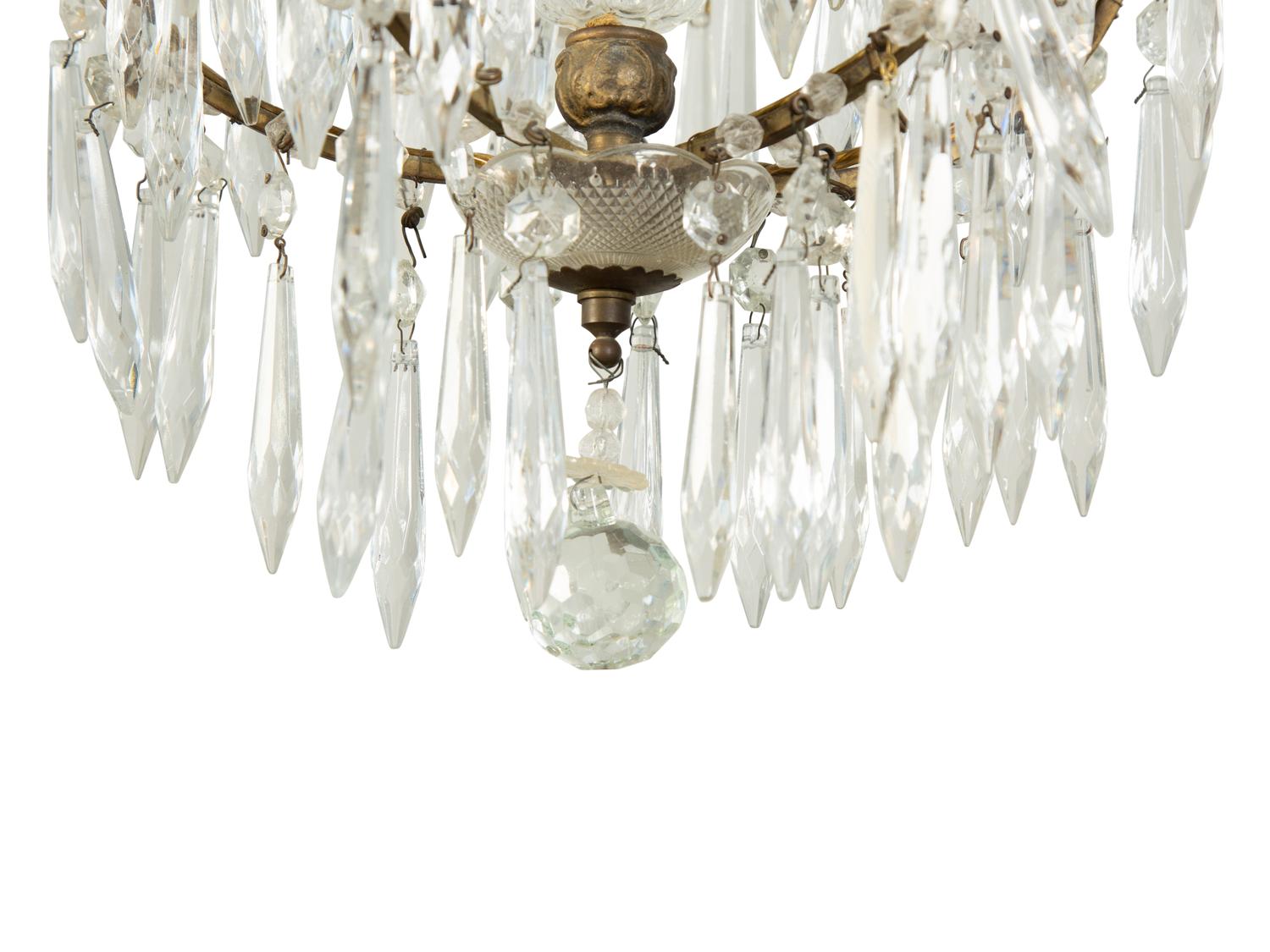 A Gilt Metal and Cut Glass Five-Light Chandelier