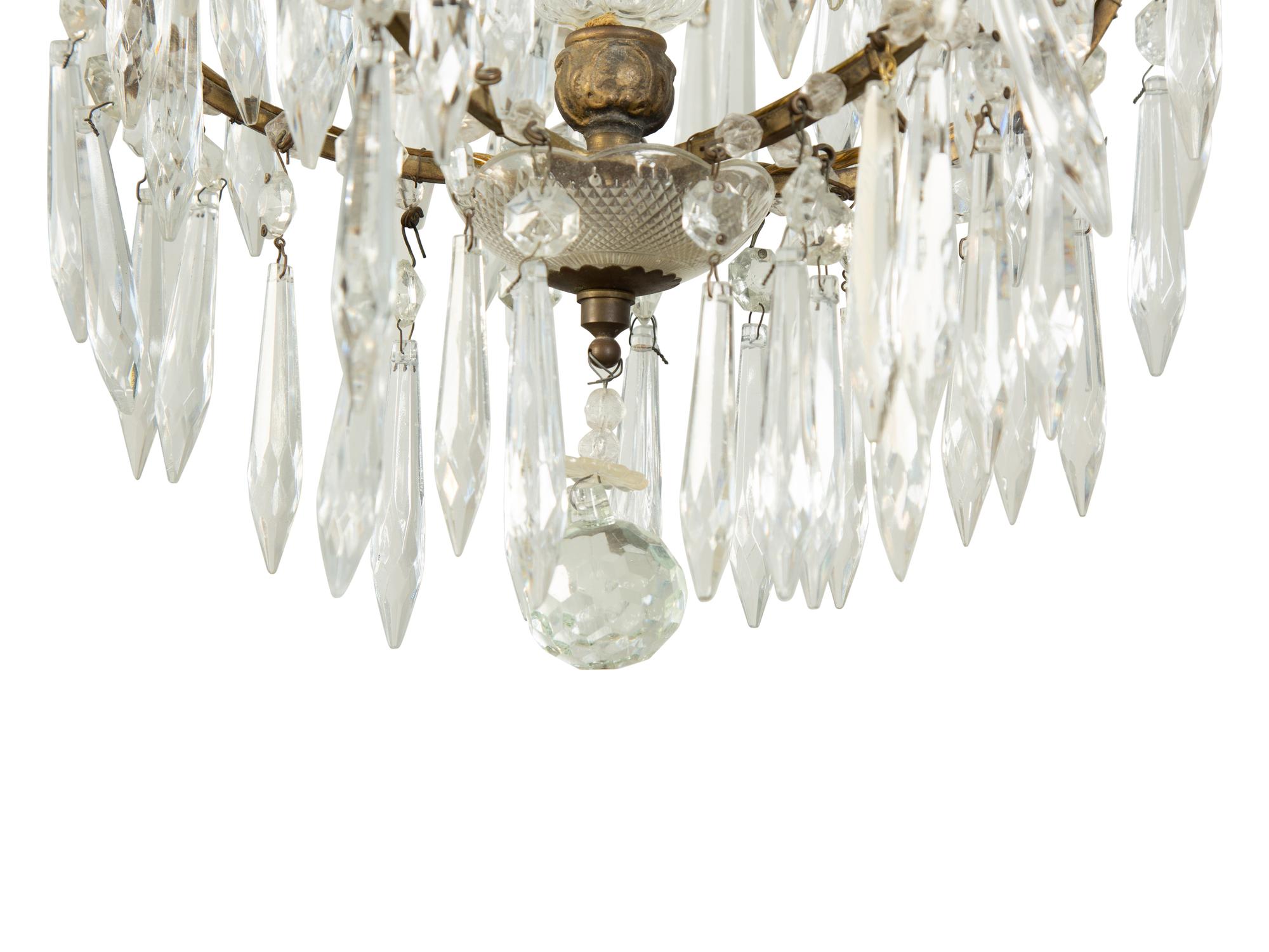 A Gilt Metal and Cut Glass Five-Light Chandelier