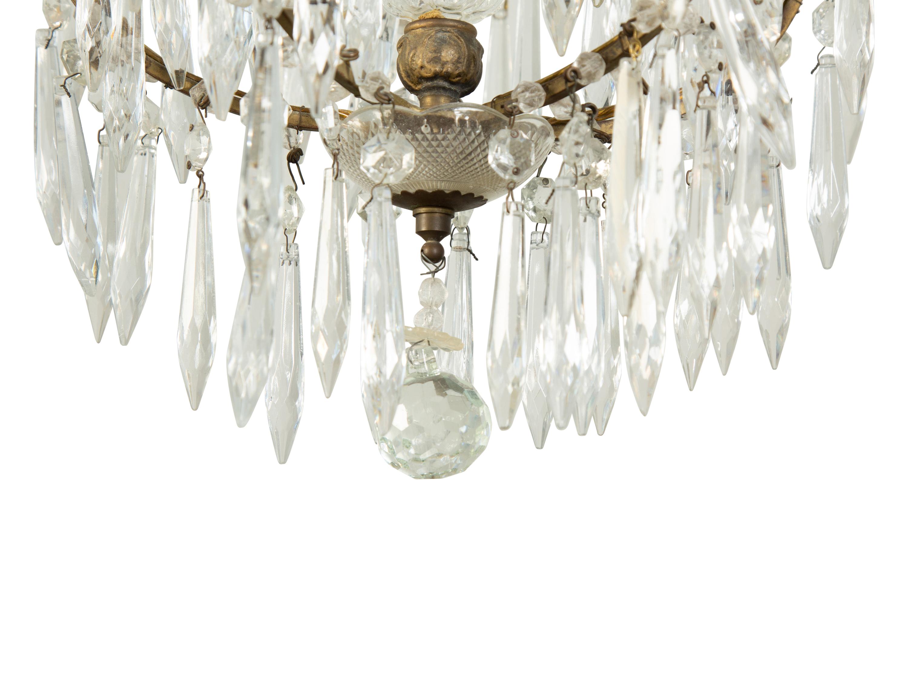A Gilt Metal and Cut Glass Five-Light Chandelier