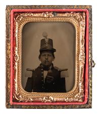 [MILITIA]. Ninth plate ruby ambrotype of a New England militiaman with a cheroot.