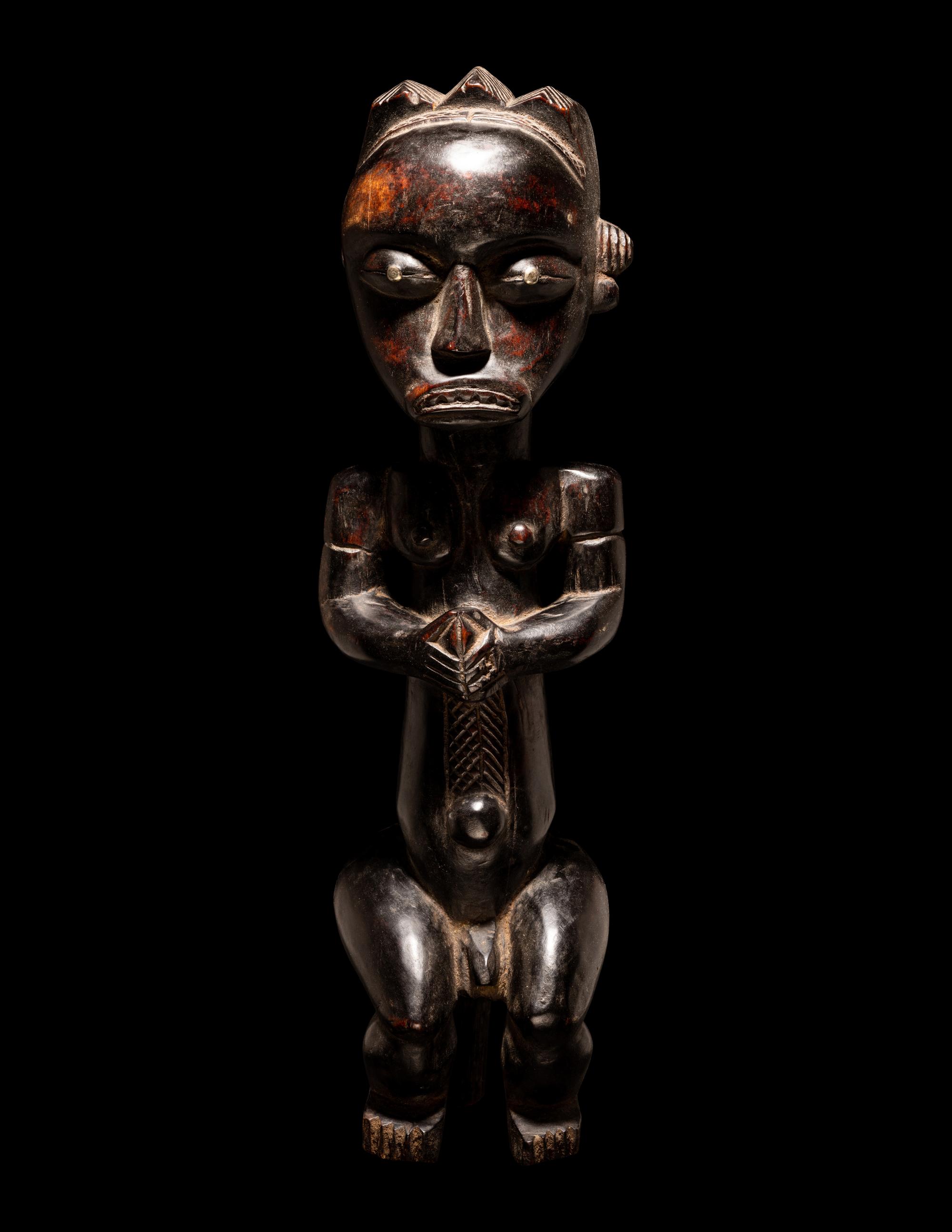 A Fang Wood Standing Figure