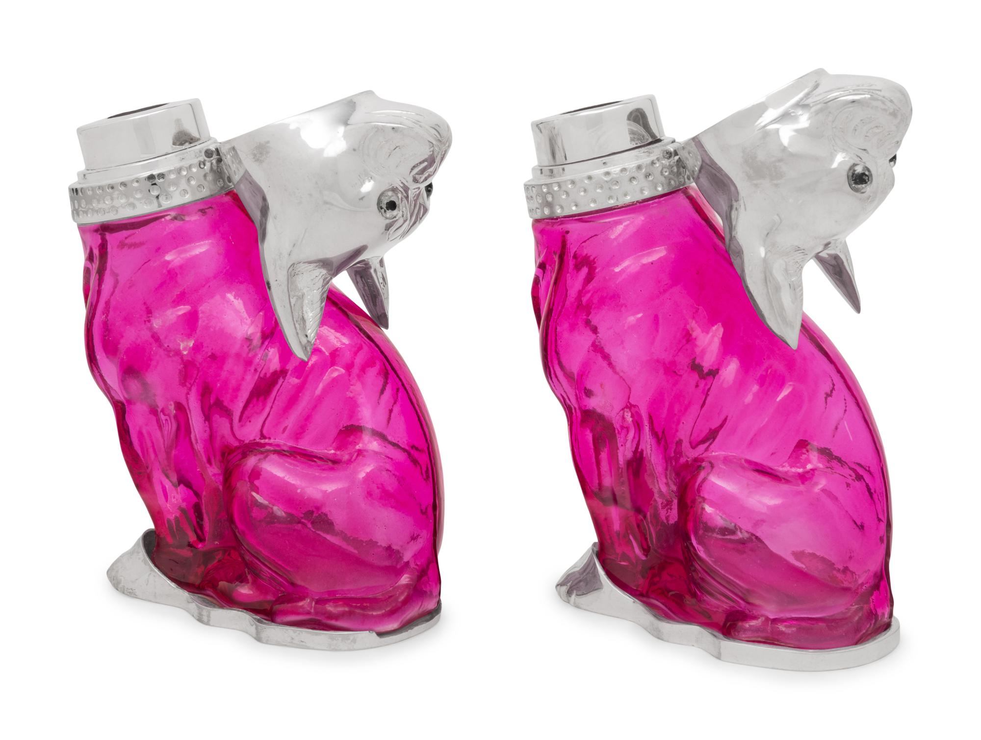 A Pair of Silver-Plate and Pink Glass Bulldog Decanters