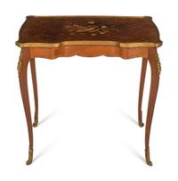 A Transitional Louis XV/XVI Gilt Bronze Mounted Marquetry Writing Table