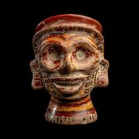 A Mixtec Polychrome Vessel in the form of a Head