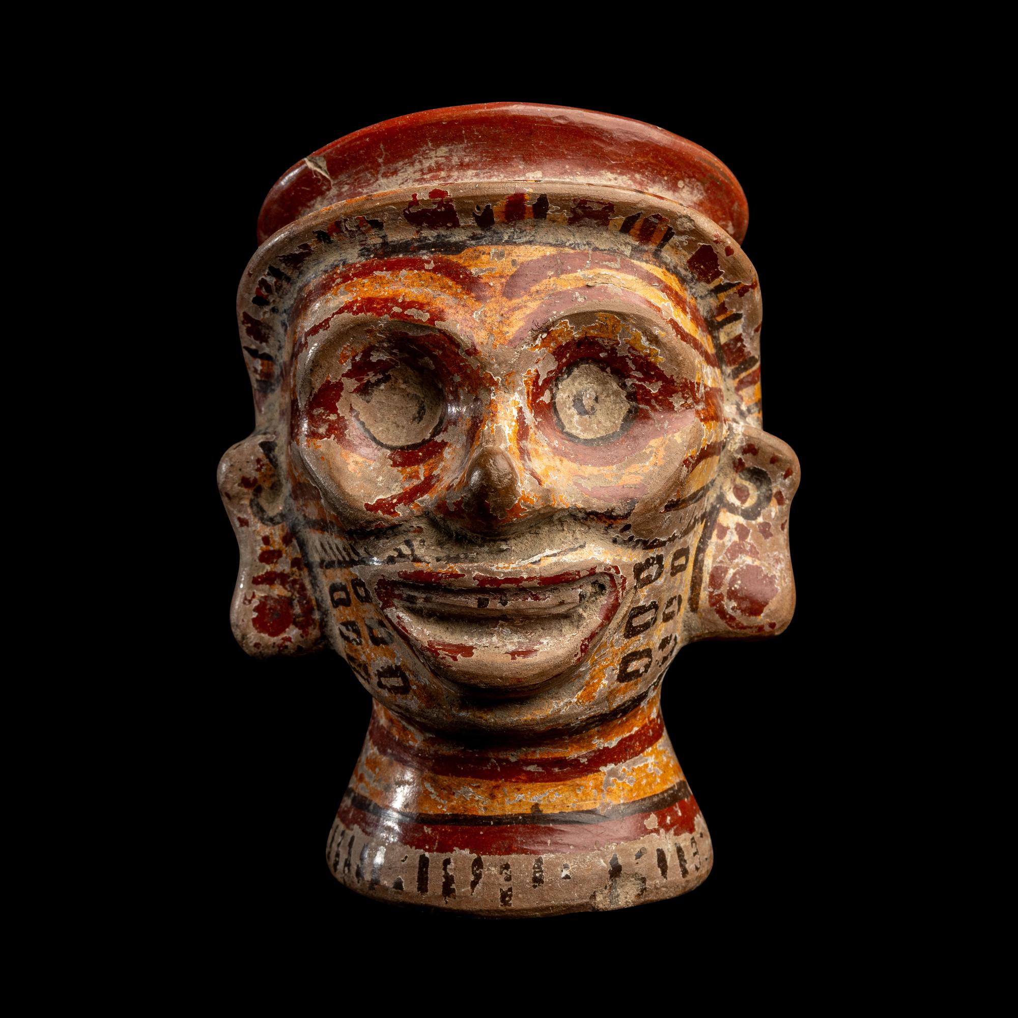 A Mixtec Polychrome Vessel in the form of a Head