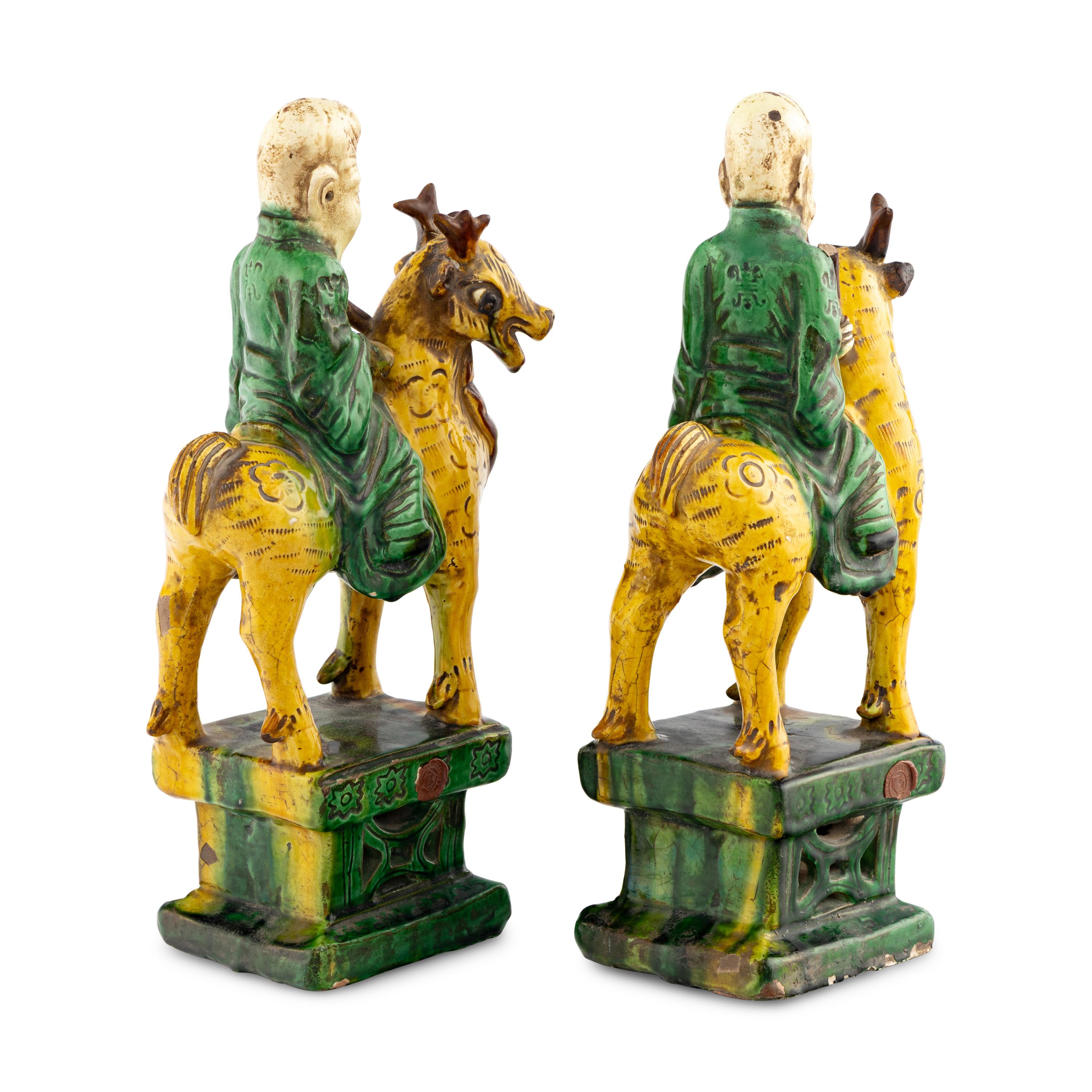 A Pair of Chinese Glazed Earthenware Figures