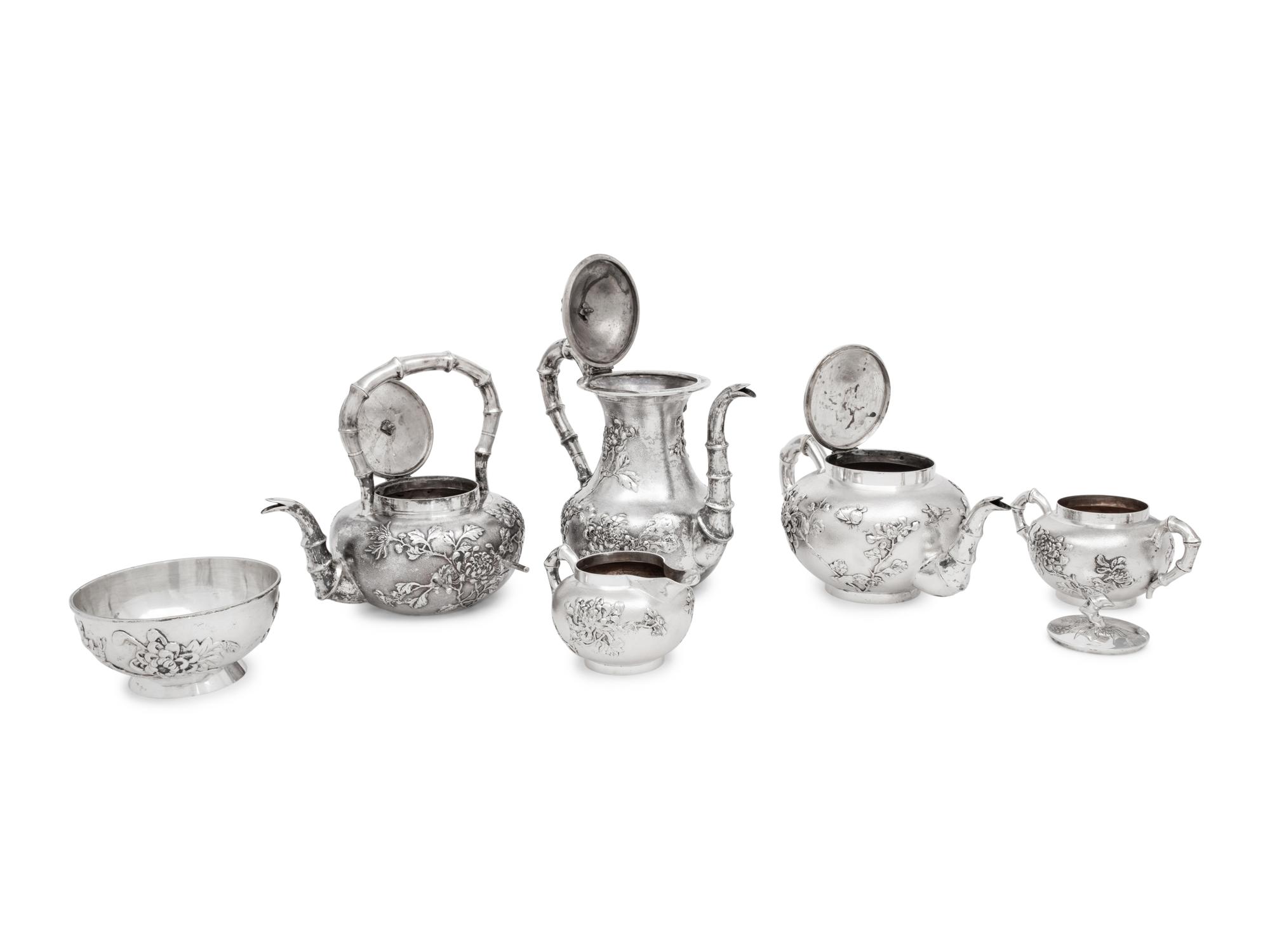 A Chinese Export Eight-Piece Silver Tea and Coffee Service
