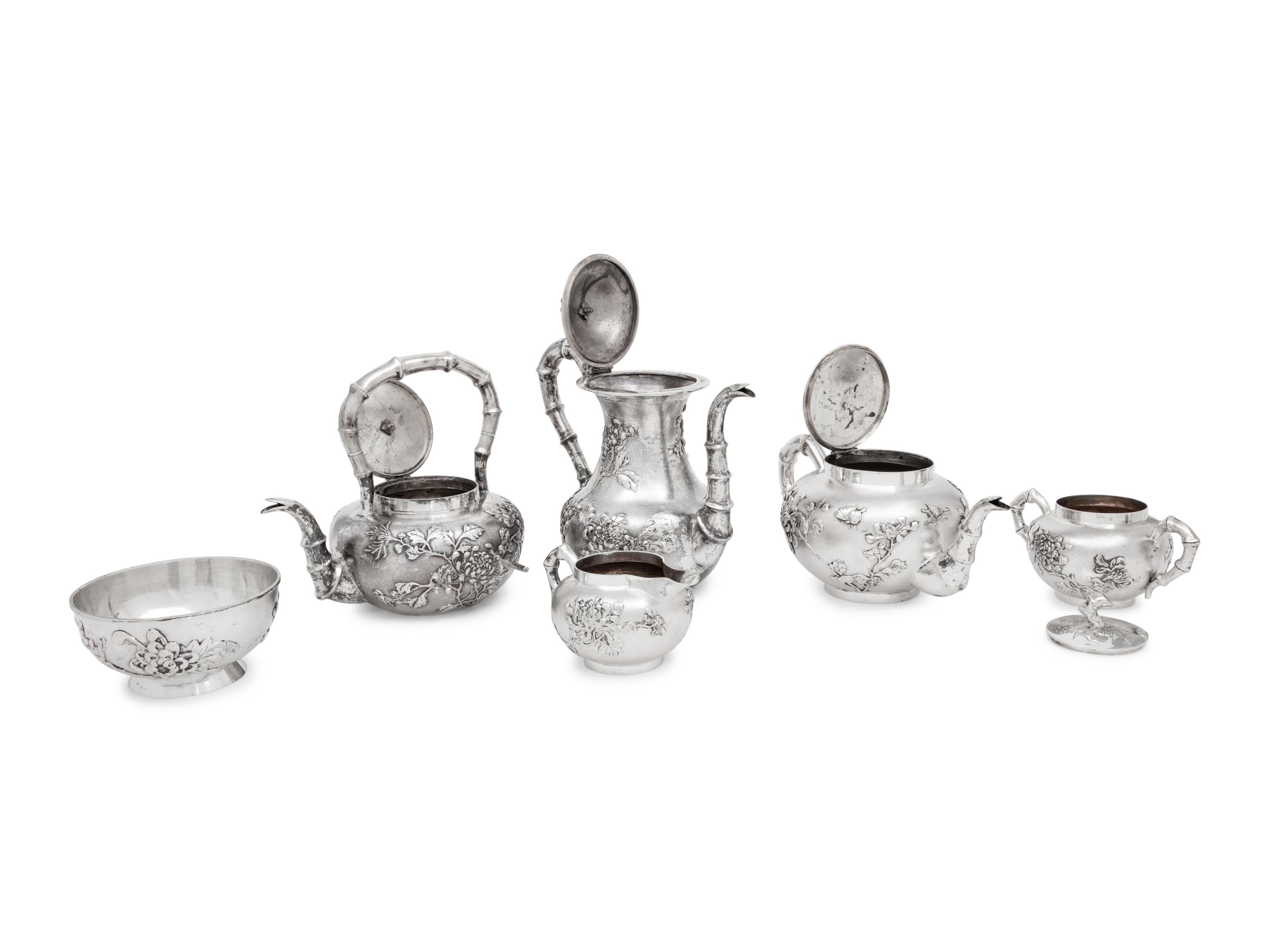 A Chinese Export Eight-Piece Silver Tea and Coffee Service