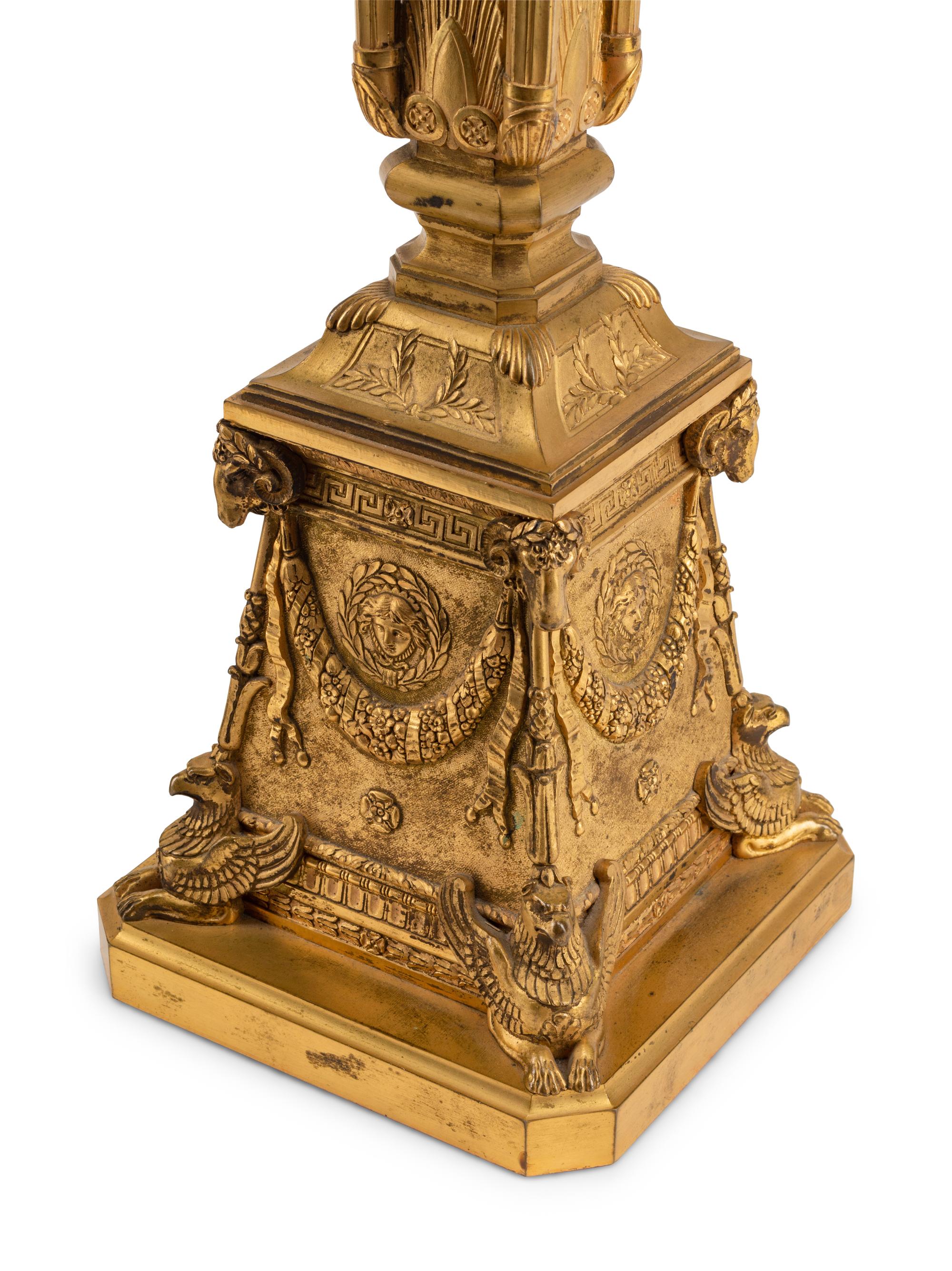 A Pair of Empire Style Gilt Bronze Five-Light Candelabra