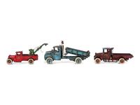 Three Arcade Painted Cast Iron Toy Trucks