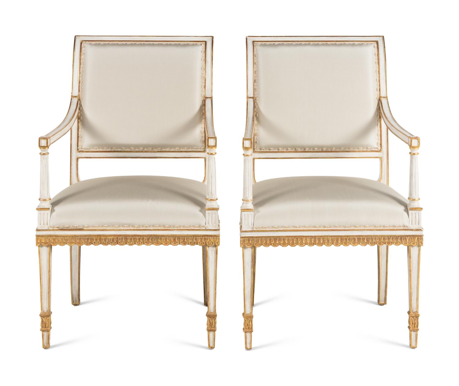 A Pair of Painted and Parcel Gilt Armchairs