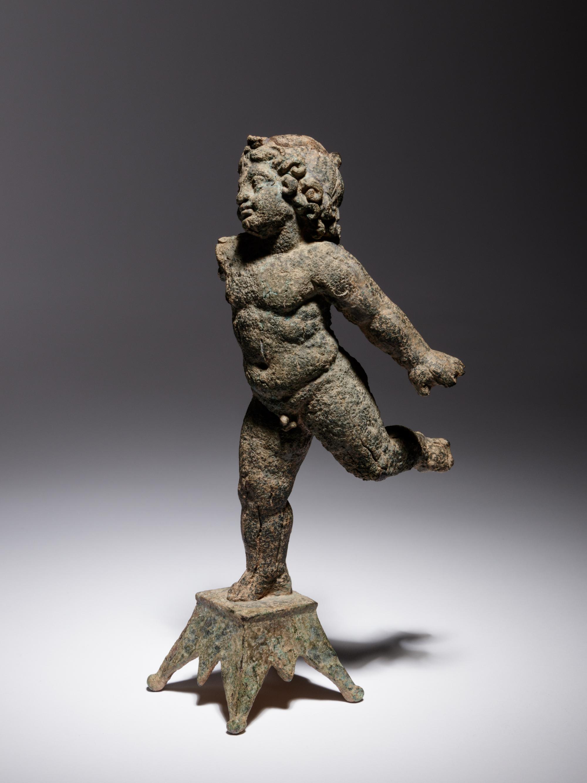 A Roman Bronze Figure of Eros