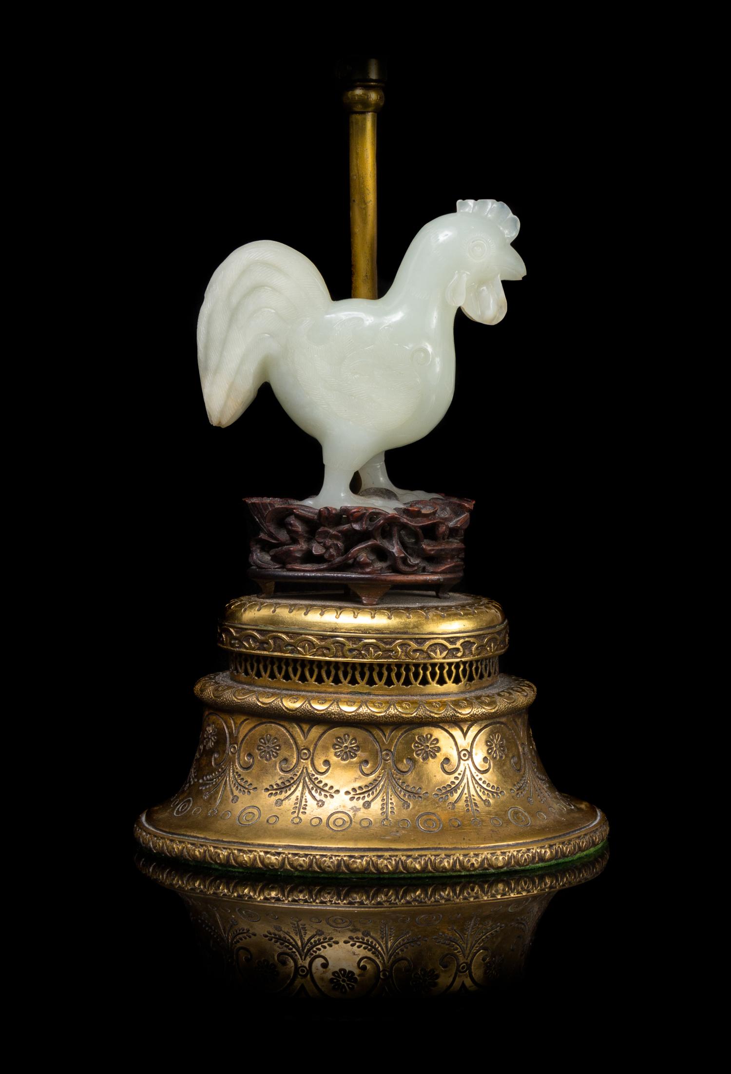 A Chinese Carved White Jade Rooster 18TH/19TH CENTURY Height overall 11 1/8 inches. — 18TH/19TH CENTURY