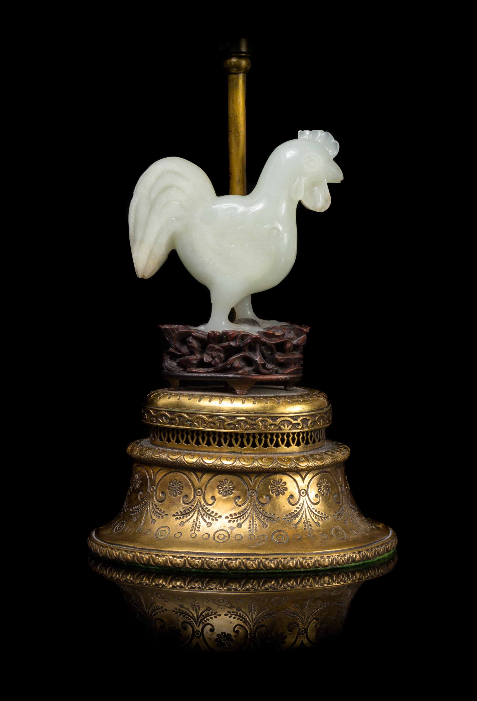 A Chinese Carved White Jade Rooster 18TH/19TH CENTURY Height overall 11 1/8 inches. — 18TH/19TH CENTURY