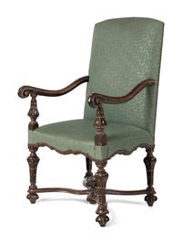 A Pair of Louis XIV Walnut and Shell-Inlaid Fauteuils