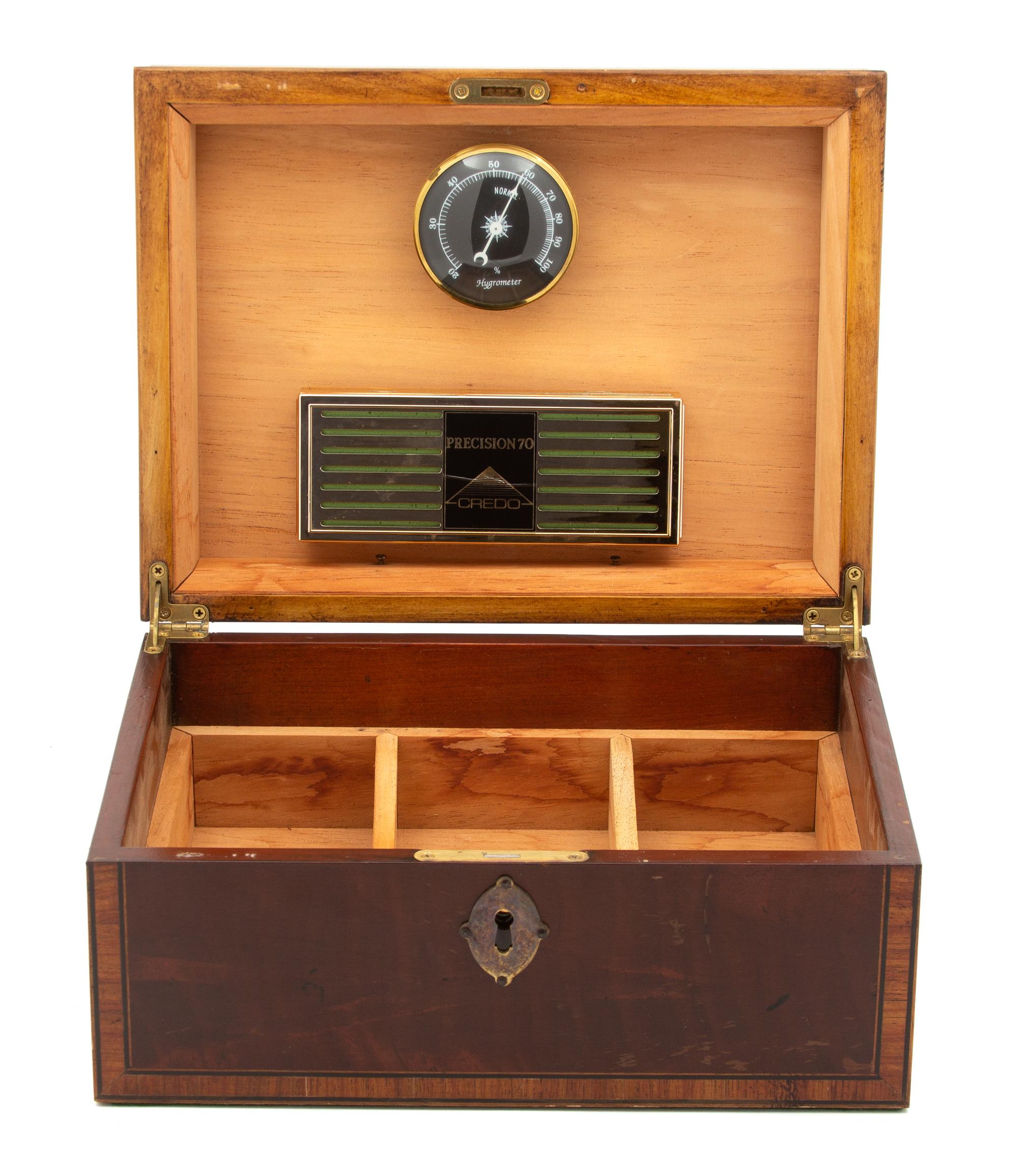 Three Wood Humidors Height of largest 5 1/4 x width 12 1/8 x depth 9 1/8 inches. — 20TH CENTURY