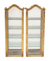 A Pair of Italian Giltwood Hanging Vitrine Cabinets