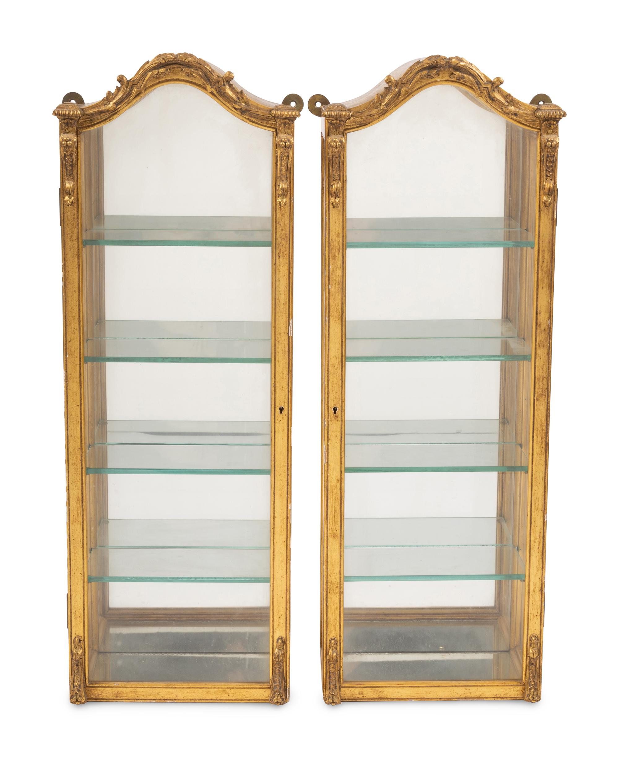 A Pair of Italian Giltwood Hanging Vitrine Cabinets