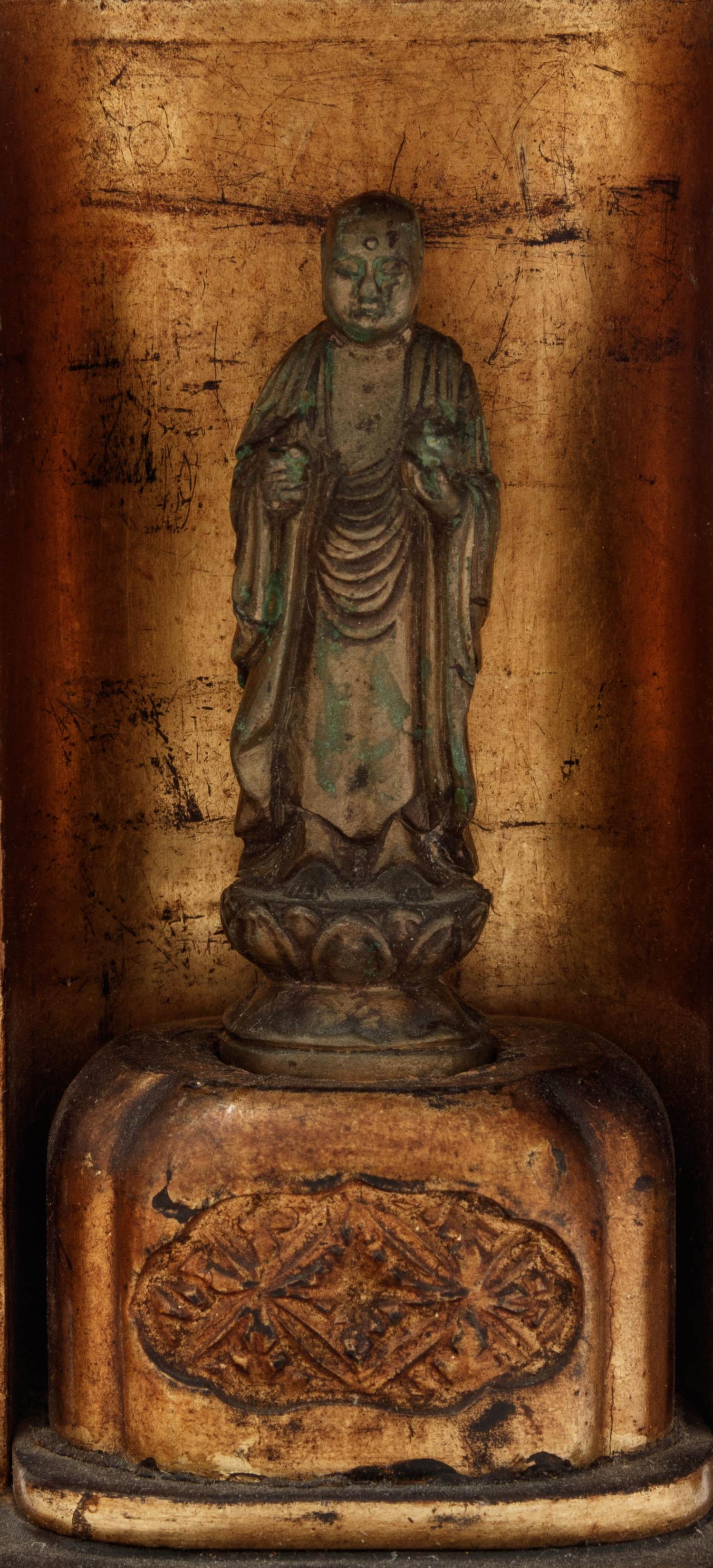 A Small Japanese Black Lacquered Buddhist Shrine with a Small Gilt Bronze Figure of Standing Buddha