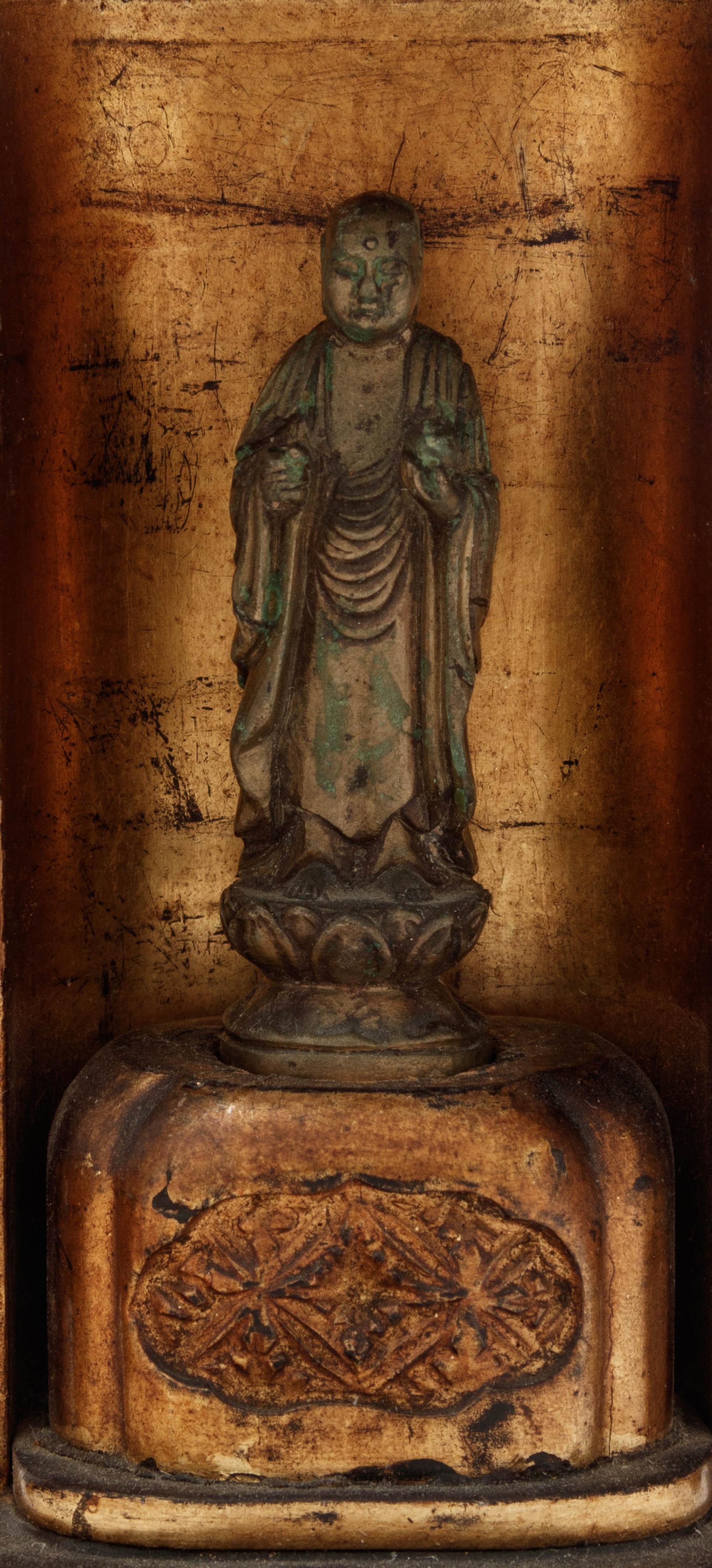A Small Japanese Black Lacquered Buddhist Shrine with a Small Gilt Bronze Figure of Standing Buddha