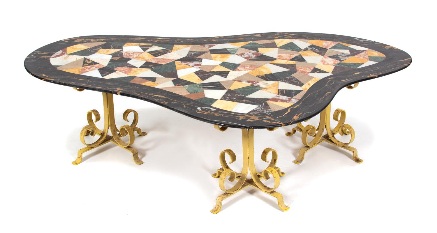 An Italian Boomerang-Form Marble Specimen Table on Painted Wrought Iron Base Height 17 x width 53 x depth 30 inches. — 20TH CENTURY