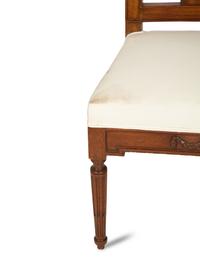 A Set of Eight Italian Walnut Dining Chairs