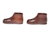 A Pair of Finely Crafted Glazed Pottery Shoes