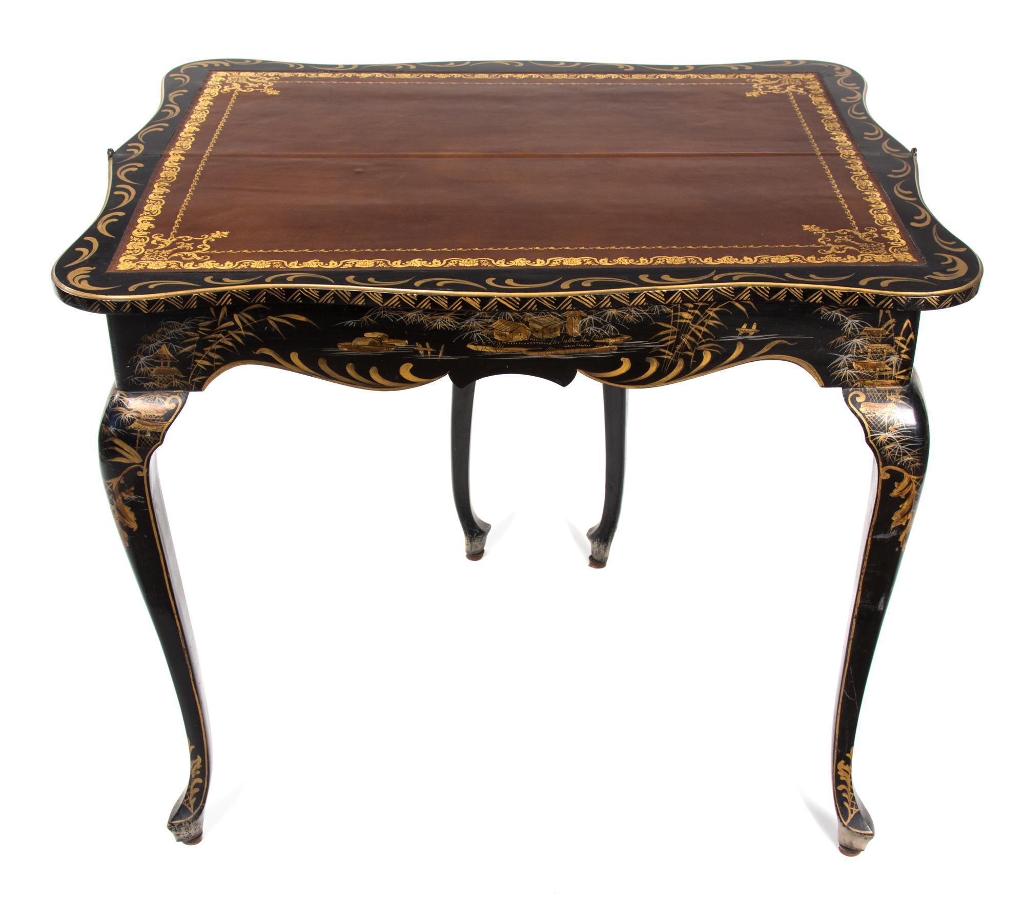 A Louis XV Style Black and Gilt Lacquered Flip-Top Card Table Height 30 x width 36 x depth 15 inches (closed). — 20TH CENTURY