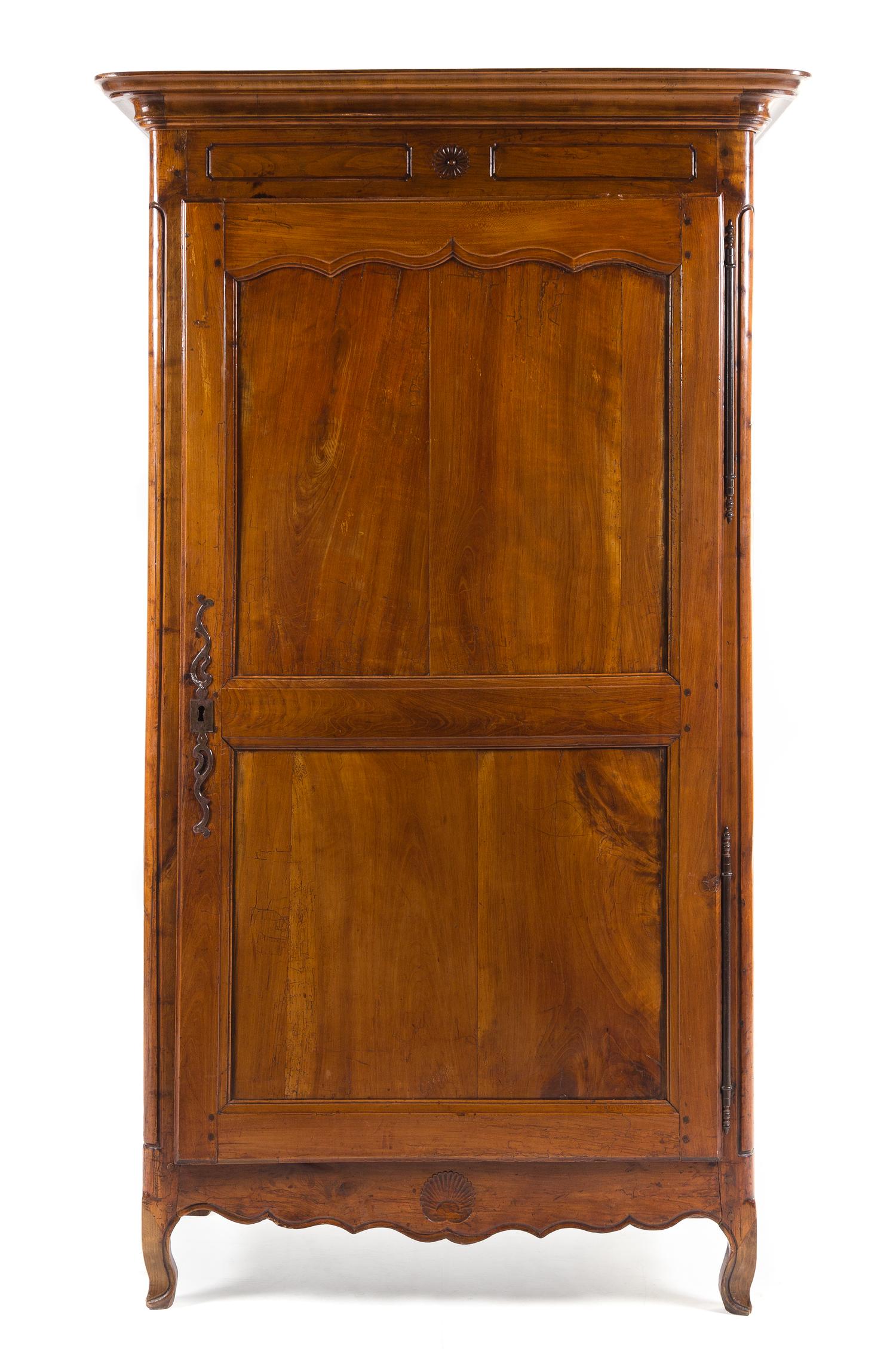 A Louis Philippe Walnut Armoire Height 79 1/8 x width 45 1/4 x depth 25 inches. — MID-19TH CENTURY