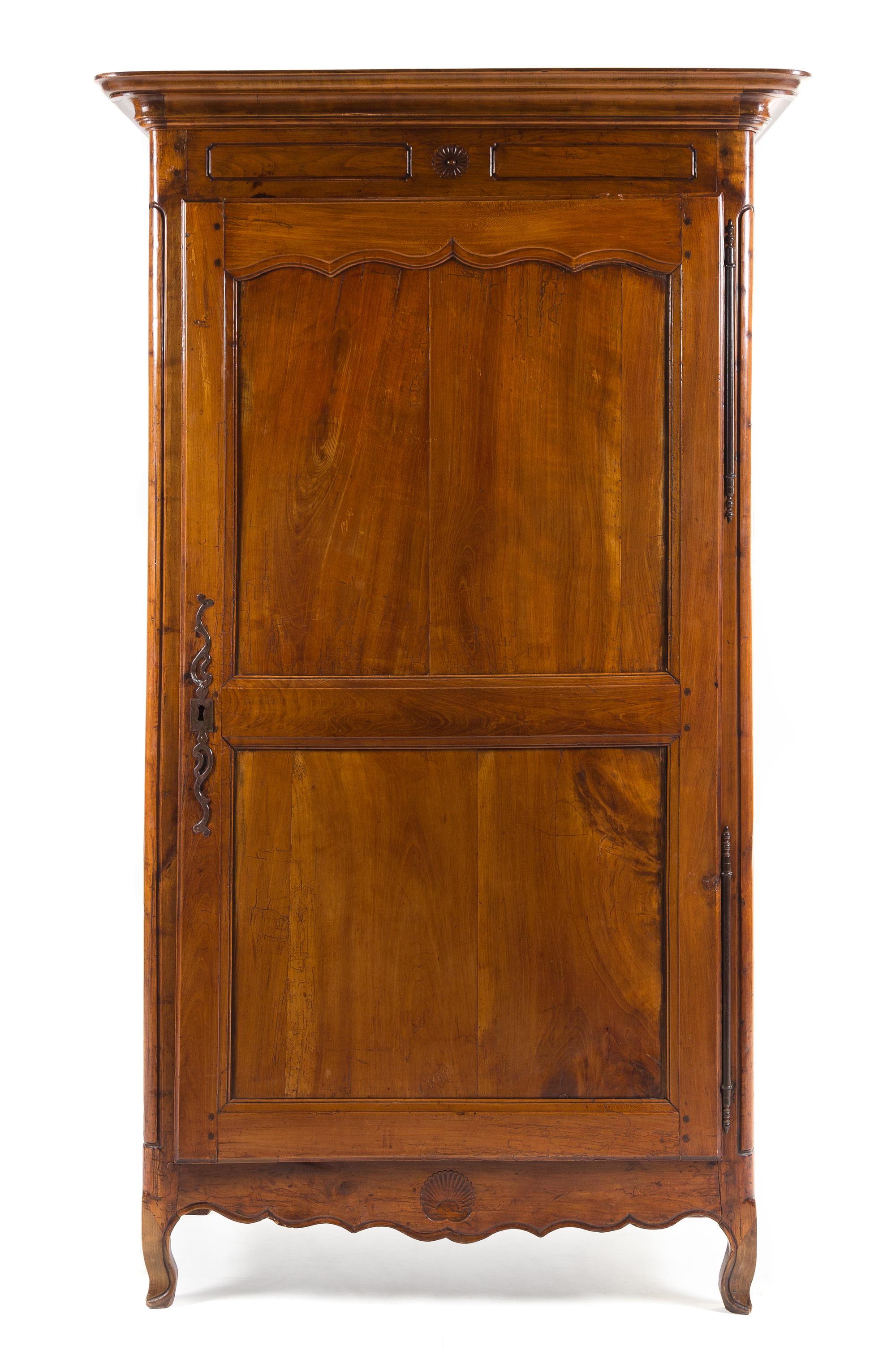 A Louis Philippe Walnut Armoire Height 79 1/8 x width 45 1/4 x depth 25 inches. — MID-19TH CENTURY